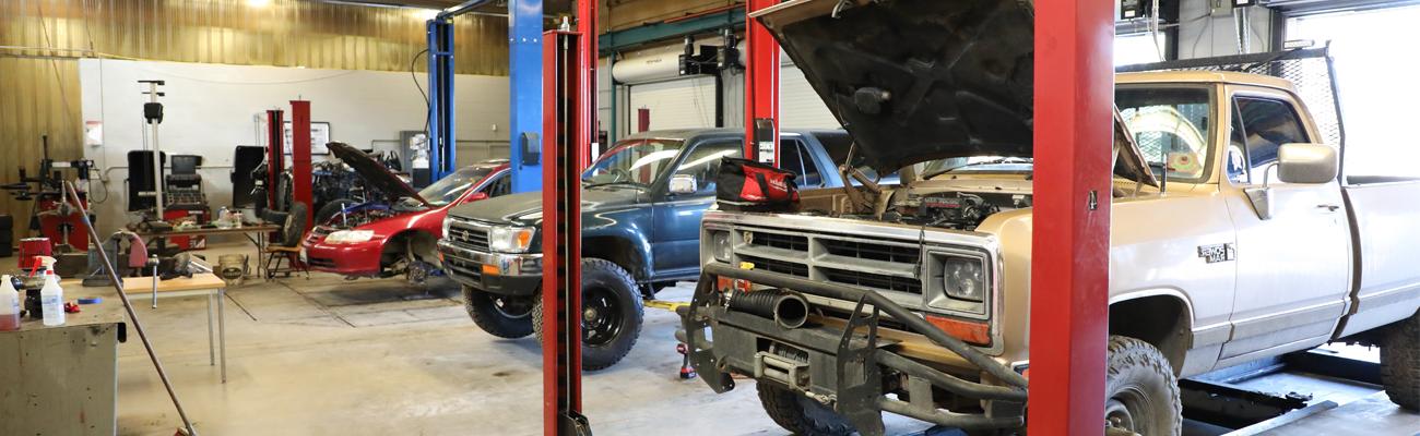 Student working on a car